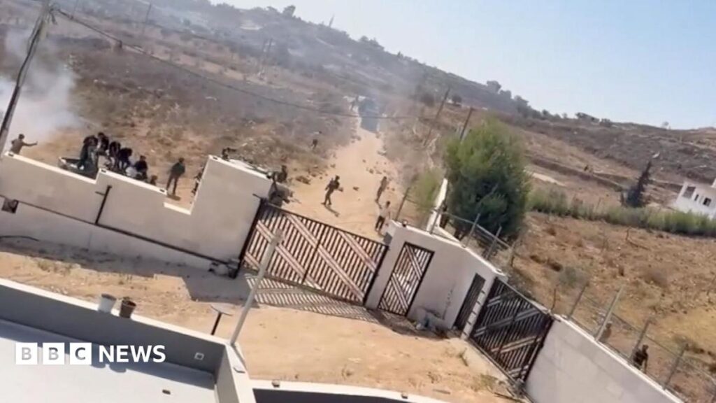 Israeli settlers besiege two Palestinian families in West Bank village as forces withdraw