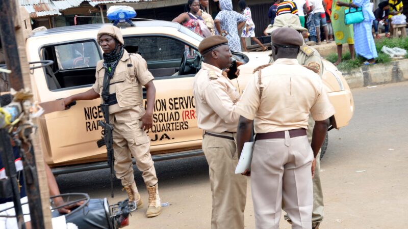 Nigeria Immigration Rescues 2 Trafficking Victims, Arrests 12 QNET Suspects