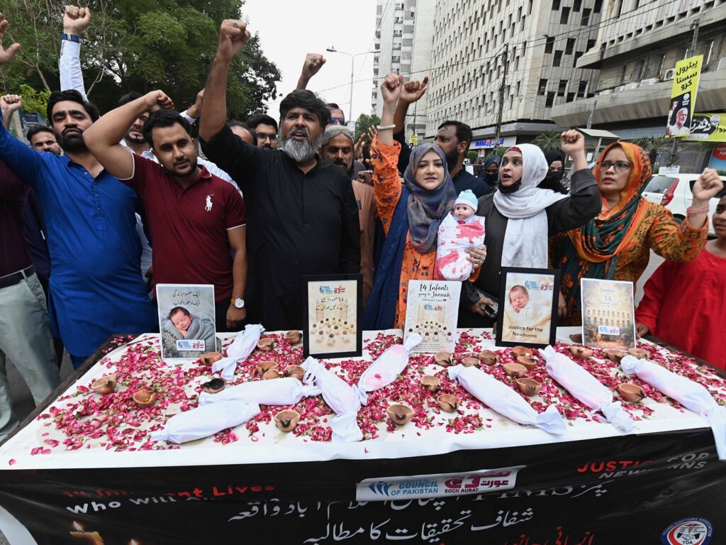 Pakistan suspends 8 officials after Islamabad hospital fire kills 14 babies